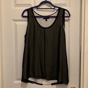 Black and white sleeveless top.